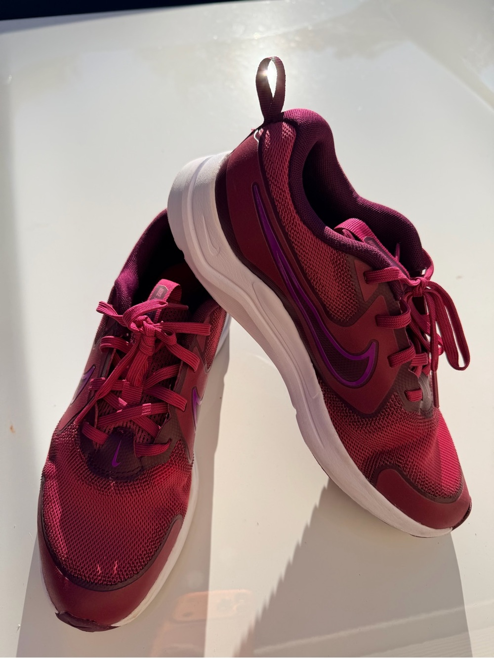 Nike Athletic Sneakers in Burgundy with Purple Accents.